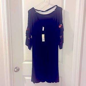 This dress is so classy. It’s a size 14 beautiful fitting dress.